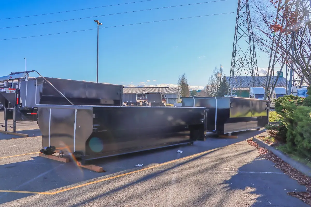 Roll-off dumpster ready for waste disposal at job site for 2 Yard Dumpster Rental in Clarkson